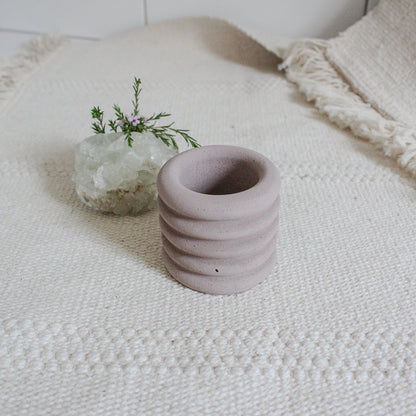 small jar in dusty pink color