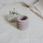 small jar in dusty pink color